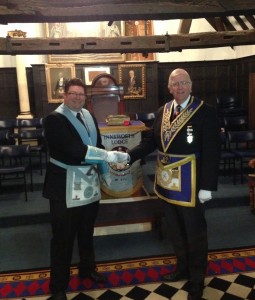 The Worshipful Master, WBro Andy Skelton congratulating WBro Peter Brindle Assistant Grand Sword Bearer